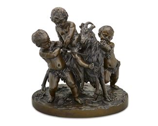 1127
After Claude Michel
1738-1814, French
Figural Group Of Putti Riding A Goat
Patinated bronze
Signed: d'apres Clodion / [artist's cipher]
15.5" H x 16" W x 11" D
Estimate: $2,000 - $3,000