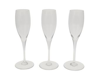 1143
A Set Of Baccarat "Saint Remy" Champagne Flutes
20th Century
Each etched: Baccarat / France
Each crystal champagne flute with smooth stem, 18 pieces
Each: 8.625" H
Estimate: $400 - $600