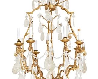 1154
A French Louis XV-Style Rock Crystal Chandelier
20th Century
The gilt-metal chandelier with a scrolled cage frame issuing eight upward arms, each terminating in a candle sleeve light socket, decorated with rock crystal and cut glass pendalogues, glass bead chains, and glass rosettes, electrified
43" H x 25.5" Dia. approximately
Estimate: $3,000 - $5,000
