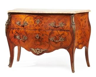 1155
A French Marquetry Commode
Late 19th/Early 20th Century
The marble top over two long drawers with floral marquetry veneer and gilt-bronze mounts raised on slightly outswept legs with sabots to the feet
34" H x 48.5" W x 21.5" D
Estimate: $1,200 - $1,800