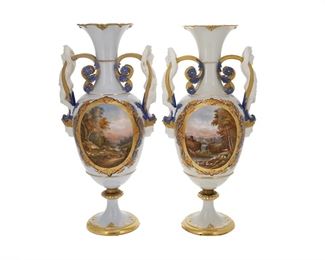 1169
A Pair Of French Limoges Porcelain Vases, By Henri Ardant And Co.
Late 19th/Early 20th Century
Each impressed: HA & Cie.
Each baluster-form vase centering a reserve of a pastoral figural scene and floral sprays with gilt highlights on a lilac ground flanked by bisque putti handles terminating in figural masks, 2 pieces
Each: 21.25" H x 10" W x 6.5" D
Estimate: $2,000 - $3,000