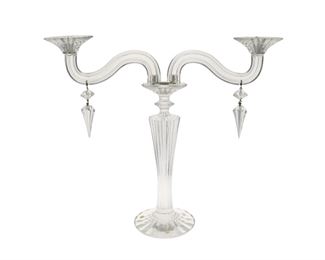 1173
A Baccarat Crystal "Mille Nuits" Candelabrum
20th Century
Etched: Baccarat / France
The crystal candelabrum with a ribbed stem issuing two scrolled arms suspending drops
16.25" H x 18.75" W x 3.75" D
Estimate: $800 - $1,200