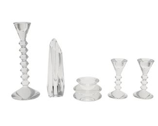 1192
A Group Of Baccarat Crystal Items
20th Century
Each etched: Baccarat / France
Comprising a tall "Vega" candlestick (10.375" H x 4" Dia.), a pair of short "Vega" candlesticks (each: 5.25" H x 2.75" Dia.), a bud vase (8.25" H x 2.5" W x 2.5" D), and an ink well (2.375" H x 4.125" Dia.), 5 pieces
Estimate: $300 - $500