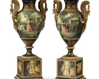 1194
A Pair Of Hand-Painted Urns
Fourth-Quarter 20th Century or Later
Each baluster-form, resin urn with hand-painted figural courting scenes and gilt highlights, flanked by opposed swan handles and raised on a square base, 2 pieces
Each: 33.5" H x 15" W x 10.5" D
Estimate: $1,200 - $1,800