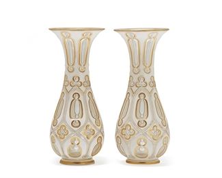 1195
A Pair Of Bohemian Art Glass Vases
Late 19th/Early 20th Century
Each acid-cut, bluster-form vase cut from white to clear glass, adorned with gilt highlights, 2 pieces
Each: 11.325" H x 5" Dia. approximately
Estimate: $1,000 - $1,500