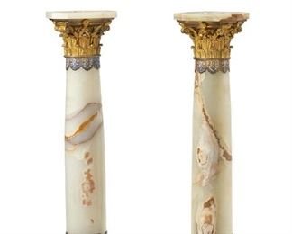 1205
A Pair Of French Onyx And Champlevé Enamel Pedestals
Fourth-Quarter 19th Century
Each onyx stand with square top over a round column and raised on a stepped square base, finished with gilt-bronze and champleve enameled mounts, 2 pieces
Each: 40.75" H x 14" W x 14" D
Estimate: $6,000 - $8,000
