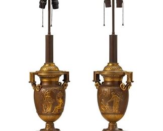 1210
A Pair Of Ferdinand Barbedienne Bronze Table Lamps
19th Century
Each signed: F. Barbedienne
Each patinated bronze, baluster-form lamp centering a Classical figural scene with opposed square handles raised on a red marble footed base and surmounted by a contemporary shade with gilt highlights, electrified, 2 pieces
Each base: 39.5" H x 9" W x 9" D; Each shade: 13.5" H x 20" Dia.
Estimate: $3,000 - $5,000