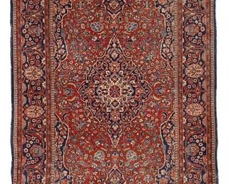 1220
A Kashan Area Rug
First-Quarter 20th Century
Wool on cotton foundation, with polychrome floral motifs and central medallion
80" L x 51.5" W
Estimate: $800 - $1,200