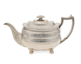1225
A Scottish Sterling Silver Tea Pot
Circa 1820
Marked with Scottish hallmarks for Edinburgh
The rectangular-form tea pot with chased foliate borders and floral sprays, a flat-topped handle, and raised on ball feet
19.145 oz. troy approximately
Estimate: $600 - $800