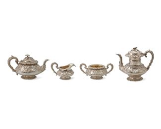 1227
An English Sterling Silver Tea And Coffee Service By Charles Thomas Fox
Circa 1834-1838
With marks for London / George IV / Charles Fox [CF]
Each with repousse and embossed foliate decoration with floral knobs and raised on pedestal feet, comprising a coffee pot (7.875" H x 9.75" W x 7" D), a teapot (5.875" H x 11" W x 7" D), a creamer (4.625" H x 7" W x 4.75" D), and a sugar bowl (3.25" H x 9.5" W x 6" D), personalized, 4 pieces
83.29 oz. troy approximately
Estimate: $5,000 - $7,000