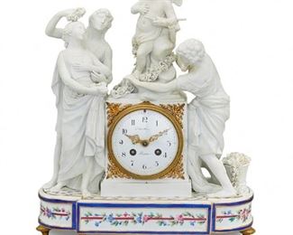 1246
A Sèvres French Empire-Style Bisque Porcelain Figural Mantle Clock
1878
Movement signed: L.P. Japy et Cie / 1878 / 4231 52; Dial signed: Cauch[...] / Paris; Porcelain bears incised Sevres mark; Further marked: 16 / r
The clock flanked with white bisque porcelain Greco-Roman figures holding flowers and surmounted by Cupid with bow and quiver standing among floral garlands centering a white painted metal dial with black Arabic numeral hour markers and outer minute track, openwork gilt hands, and two train movement set in a gilt-bronze bezel with bead trim surrounded by applied gilt-bronze foliate elements, over a glazed porcelain base with painted floral motifs and raised overall on six gilt-bronze toupie feet
17" H x 14" W x 6.125" D
Estimate: $2,000 - $3,000