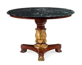 1255
A Regency-Style Table With Marble Top
20th Century
The table with a round, green marble top over a carved giltwood pedestal with acanthus leaves raised on a triform base with claw feet
30.25" H x 45" Dia.
Estimate: $1,500 - $2,000