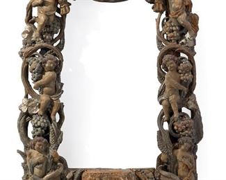 1264
A Carved Giltwood Altar Frame
Fourth-Quarter 18th Century
The giltwood altar frame/niche with carved putti and cornucopias issuing grapes and wheat, surmounted by festoon swags, surrounding a fitted pedestal base with missing central element
51" H x 32" W x 8.5" D
Estimate: $3,000 - $5,000