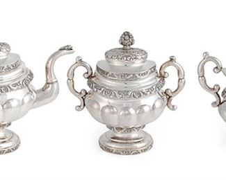 1266
A Frederick Marquand Silver Tea Service
Second-Quarter 19th Century
Each signed: F. Marquand
Each Rococo Revival-style with floral banding, gadrooned bodies, and C-scroll handles raised on an ovoid foot, comprising a tea pot (10" H x 12" W x 5.5" D), a lidded sugar bowl (9.5" x 8.5" W x 5.25" D), and a creamer (7.75" H x 7" W x 4" D), 3 pieces
78.99 oz. troy approximately
Estimate: $2,250 - $3,000