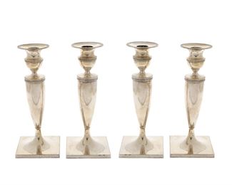 1267
A Set Of Gorham Sterling Silver Weighted Candlesticks
20th Century
Each marked for Gorham and sterling; Numbered: A2898
Each candlestick with a tapered column, removable bobeches, and chased meander trim on a square weighted foot, 4 pieces
Each: 9.25" H x 3.75" W x 3.75" D
Estimate: $600 - $800