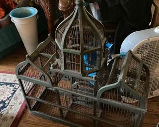 Several antique birdcages 