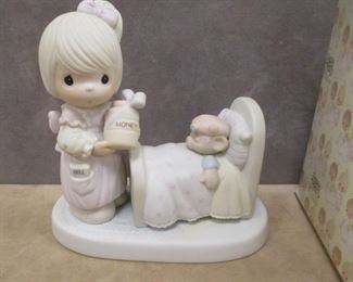A PRECIOUS MOMENTS ca 1986 PORCELAIN FIGURE, TITLED MAKE ME A BLESSING.  BASE IS 5.5" TALL, 5.25" TALL