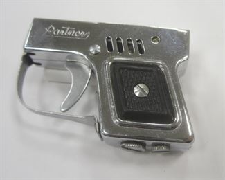 A VINTAGE JAPANESE PARTNER LIGHTER IN THE SHAPE OF A SEMI-AUTO PISTOL. TRIGGER WORKS VERY WELL, NOT TESTED WITH FLUID. 2" LONG
THE RIVET ON ONE SIDE OF THE "HAMMER" LIGHTER MECHANISM DOESN'T PROTRUDE ALL THE WAY THROUGH THE SIDE, CAUSING IT TO BE LOOSE. PLEASE PREVIEW