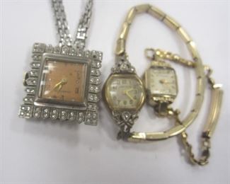 A CRAWFORD WITH SQUARE FACE WITH RHINESTONES. MISSING ON STONE
A SWISS WITTNAUER WITH NO KNOB
A GREYGOR WITH SIX SMALL DIAMONDS IN THE BAND.
NONE APPEAR TO RUN