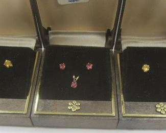 THREE PAIRS OF UNMARKED 14K YELLOW GOLD STUD EARRINGS, ONE WITH TINY PENDANT PENDANT. CITRINE AND RED TOURMALINE COLOR STONES