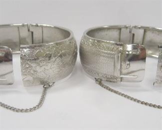 TWO OLDER VINTAGE SIGNED CORO HINGED BANGLE CUFF BRACELETS.