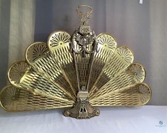 VTG Brass Plated Folding Fireplace Screen
VTG Art Deco Style folding peacock fan fireplace screen, brass plated in stand. Good condition.