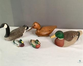 Water Fowl
Five (5) water fowl (ducks, geese) of various sizes and colors made of wood, ceramic and plastic. Canada Goose by J.B. Gaston Heritage Decoys #359/1500 Limited Edition hand crafted in Canada. Wooden duck appears to be hand carved. Small duck has damage on tail.