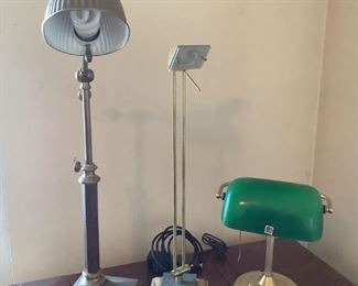 Lamps
Three (3) brass colored lamps (one) 1 has a green shade. All lamps are dusty from storage and all powered on. Tallest Lamp is 25".