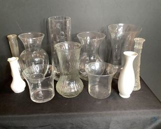 	
Glass Vases
Eleven (11) glass vases in assorted shapes and sizes. Nine (9) clear glass vases and two (2) white bud vases. No visible damage seen. Dusty from storage.