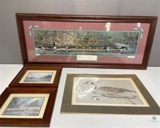 Geese Prints
Four (4) prints: "Follow the Leader" signed by R.J. McDonald @88 #2889/3000; Unframed (in plastic) signed by Geneva C. Welch H16" x W22"; Two (2) wooden framed geese in flight in winter H11" x W13" (both loose in frame). No visible damage seen on the frames.