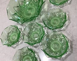 Anchor Hocking Green Vaseline Glass
One serving bowl and six (6) berry bowls. Diamonds and arches with rippled edge design. No visible wear or damage.