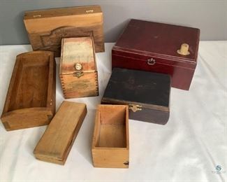 Wooden Boxes
Several wooden boxes, some are cigar style and are of various sizes, some with lids. One (1) black box w/Ford Motor Company logo.