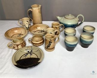 Assorted Pottery Sets
FIfteen (15) pieces total, One (1)PItcher with four (4) matching mugs, Three 3 bowls (2 have chips), One (1)Teapot and Four (4) matching cups (1 mug has a chip) and Two (2) small cups. Some are signed by the artist on the bottom. No visible damage seen.