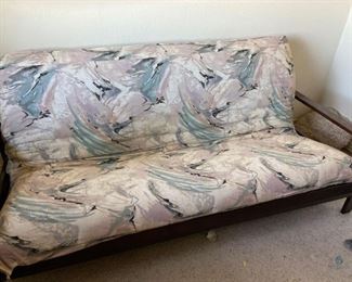 Futon
Wood frame futon with pink/gray cover (unknown manufacturer). Unable to open due to space constraints. H36" x W79" x D36". Needs cleaning
