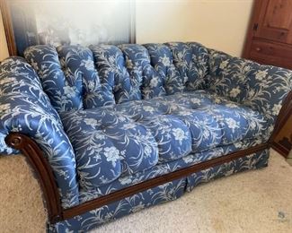 Blue/White Tufted Cotton Sofa
Sofa by Schweiger Industries in blue & white floral cotton fabric with wood accents in front. H30" x W64" x D35". Needs cleaning.