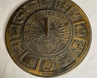 Decorative Sundial
Brass looking decorative sundial with Zodiac signs 13" diameter with hook on back for hanging.
