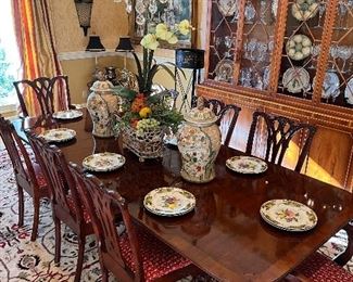 Exquisite dining room with Duncan Phyfe table and 14 Chippendale style chairs 