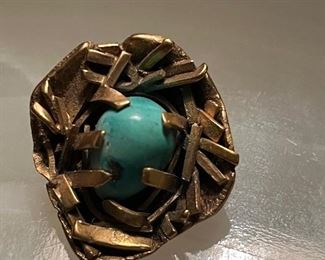 Gilt sterling Persian turquoise egg in a nest lapel pin belonging to Stella Stevens 