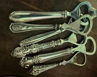 Antique sterling handle bottle openers