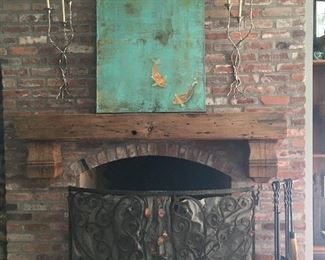 Custom made fireplace screen, candelabras, and fireplace  tools all made by metalwork  designer Julia Klein--Do you see the gorgeous painting over the fireplace?