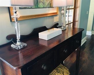 Custom  made  console table --Notice the  gorgeous  designer  lighting