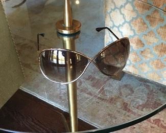 Designer items  including  this  gently  used  Tom  Ford  Sunglasses