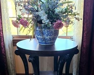 Carved accent table and large ceramic planter