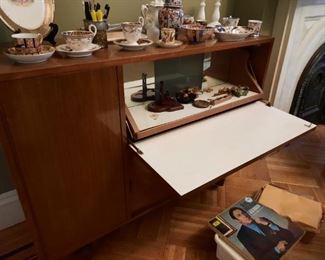 Superb 1960 cabinet with concealed  hinged bar, , storage and great  mid century modern design 