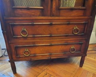 Lower part of  1960s Faux Bamboo Tall wood cabinet  with drawers and storage. We have TWO very similar twin tall cabinets ---  and a matching  "floating " wall desk.   Excellent design and quality.   PRICED TO SELL !