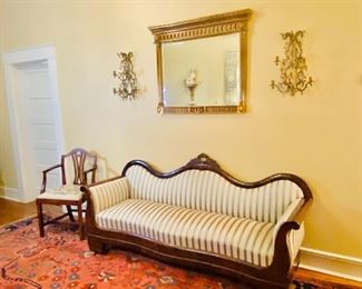 Empire sofa, decorator beveled mirror, pair of brass sconces