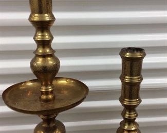LOT#6- Two brass floor candle holders 30 inches and 40 inches with moderate wear and some warping   $40.00 pair