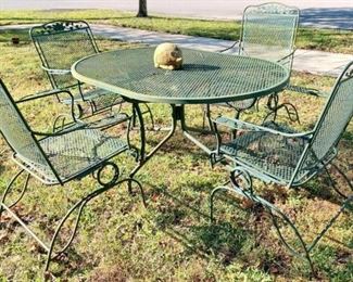 MID CENTURY MODERN PATIO TABLE WITH FOUR MATCHING CHAIRS. EXPANDED-MESH-METAL. Selling for up to $1500 on eBay.