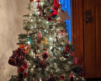 Small 4 foot Christmas Tree. Ornaments can be sold separately.