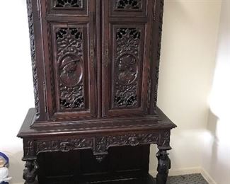 RareFrench Breton carved figural cabinet